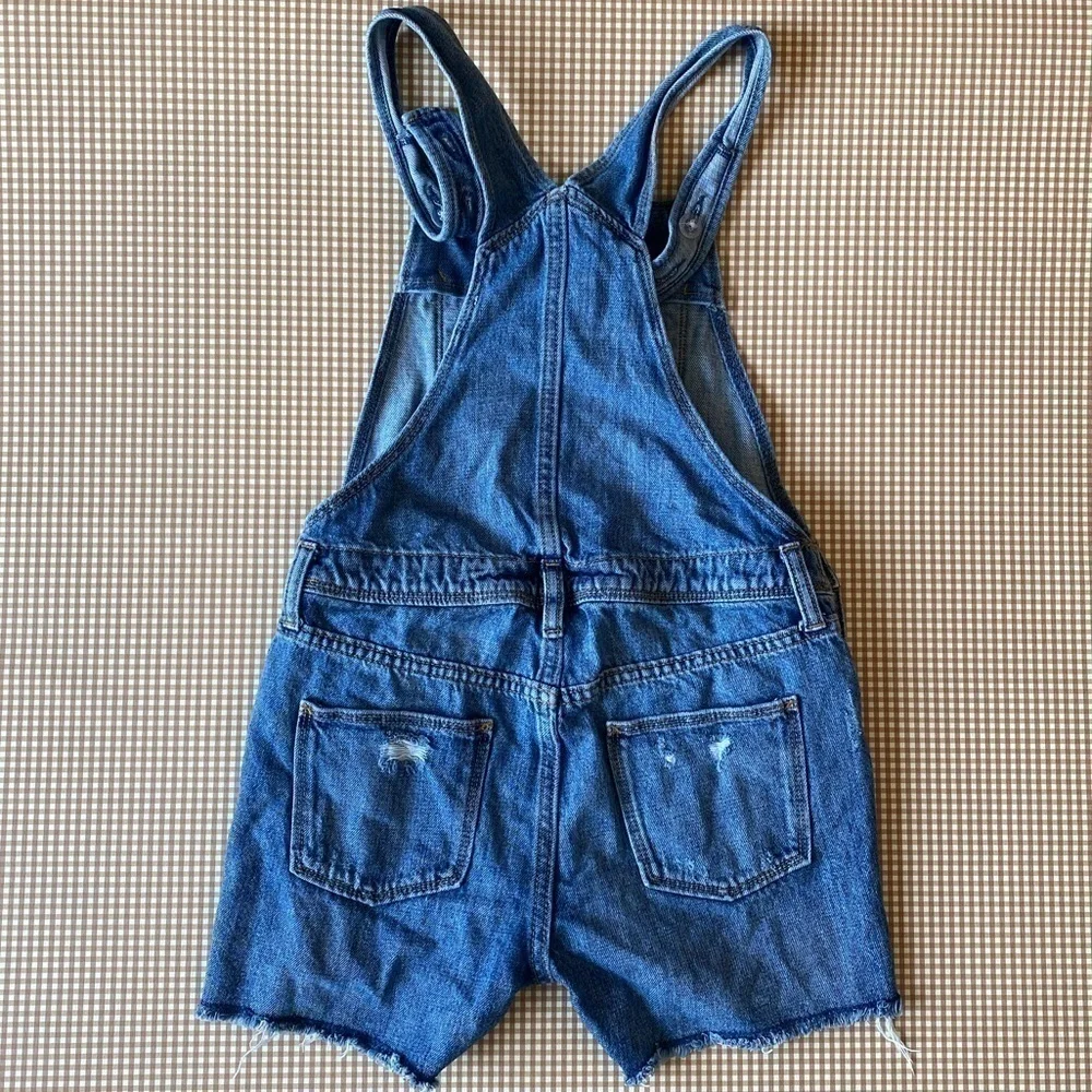 Old Navy Distressed denim shortalls. Size XL‎ Girl